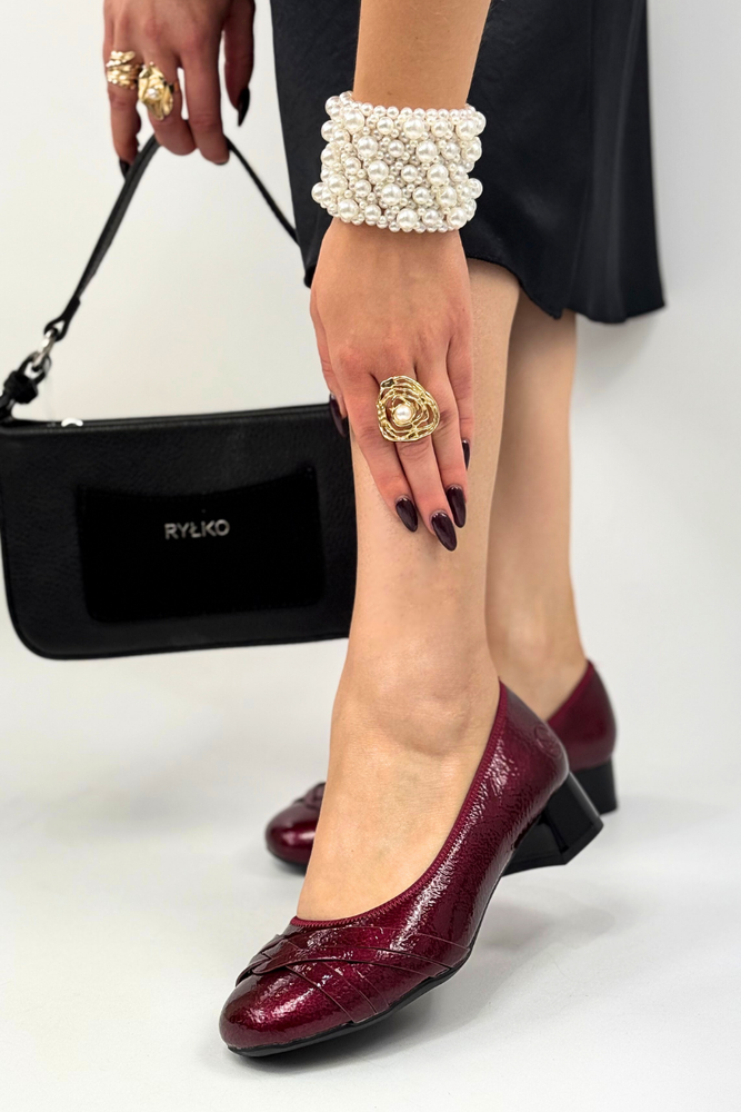 Béžové děrované lodičky s blokem Rieker