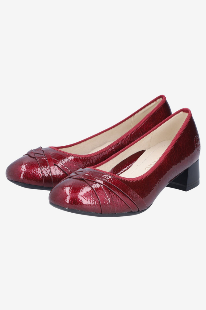 Béžové děrované lodičky s blokem Rieker