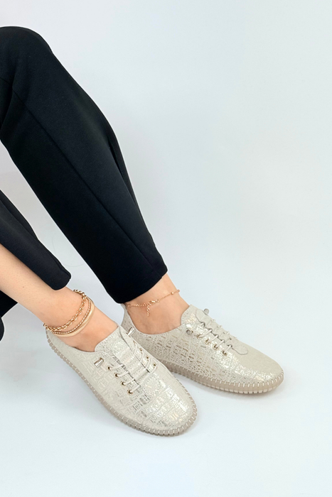 Bílé prolamované kožené boty Filippo