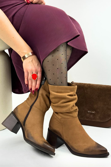 Černé kožené kotníkové boty se zipem Kordel