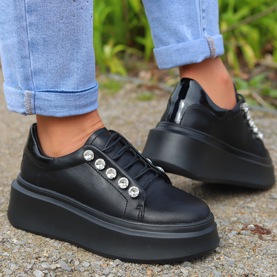 Černé kožené tenisky na platformě D&A