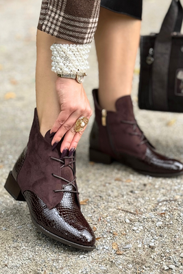 Černé kotníkové boty Potocki s ozdobným podpatkem